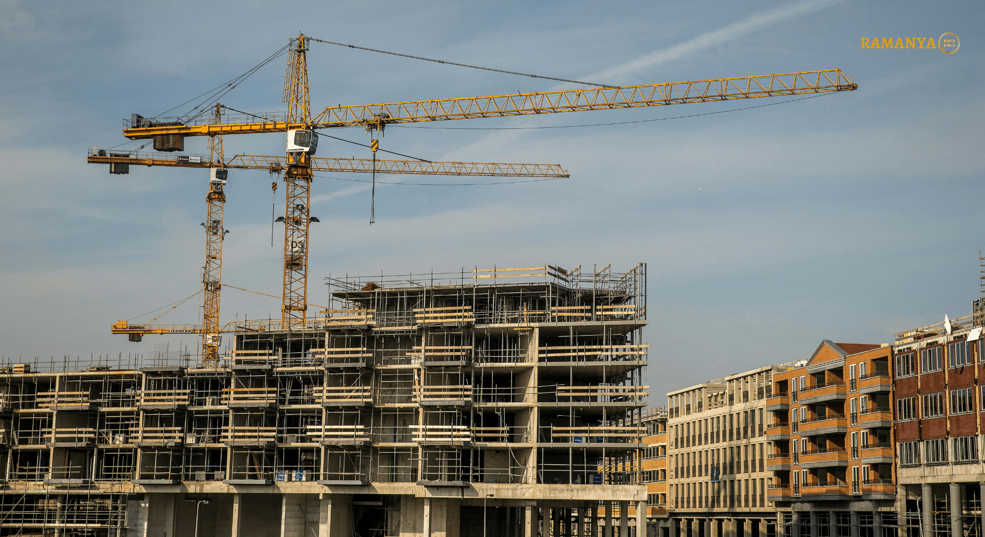 Construction site with cranes and buildings