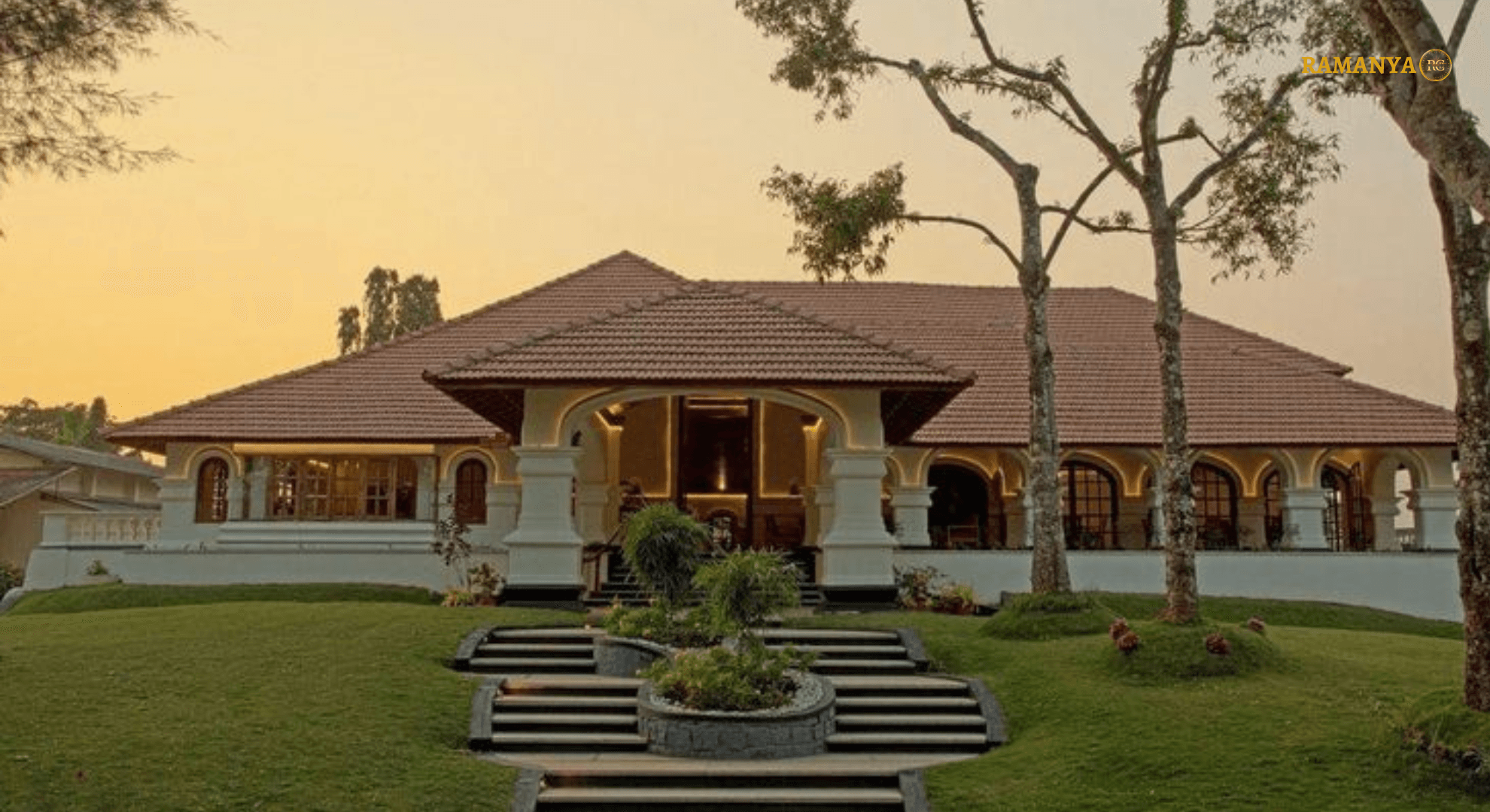 Elegant house with lush landscaping.